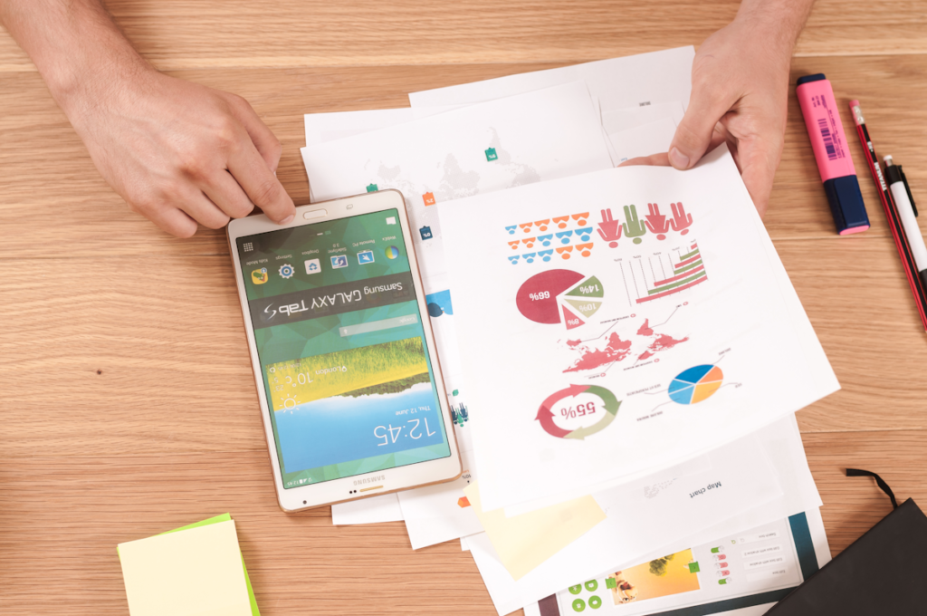 Person paying off debt and managing finances