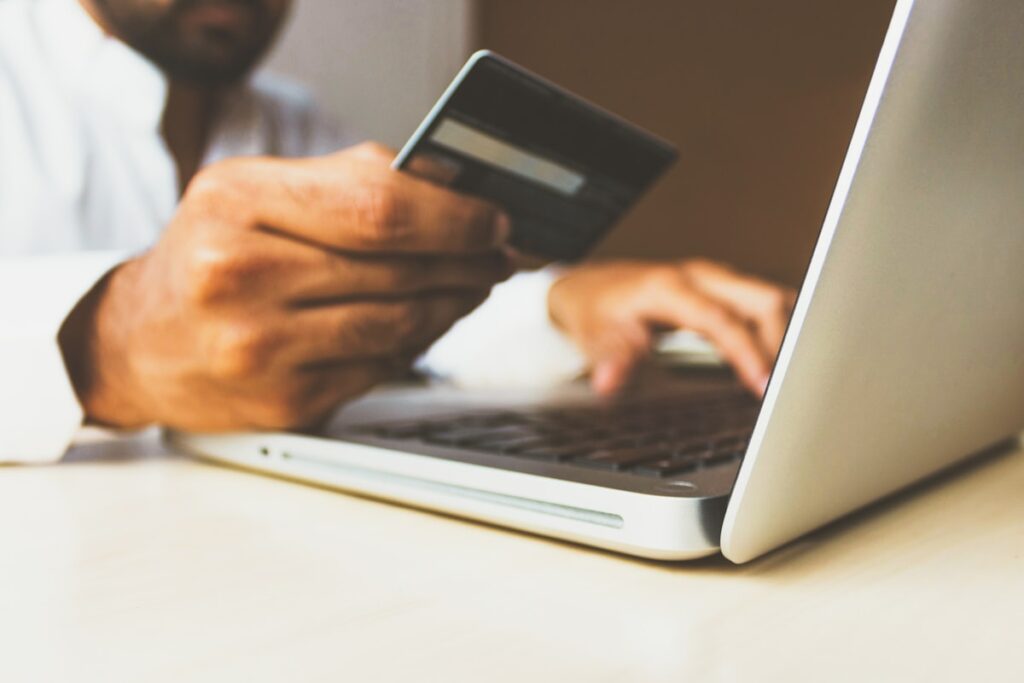 Person being cautious about online loan fraud and scams